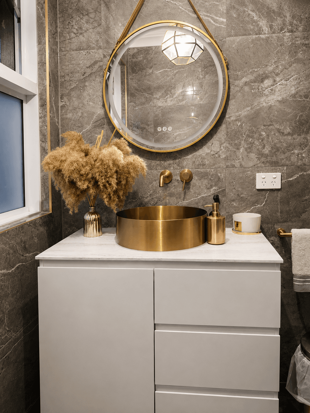 Shower niche detail with brushed gold fixtures — Southport